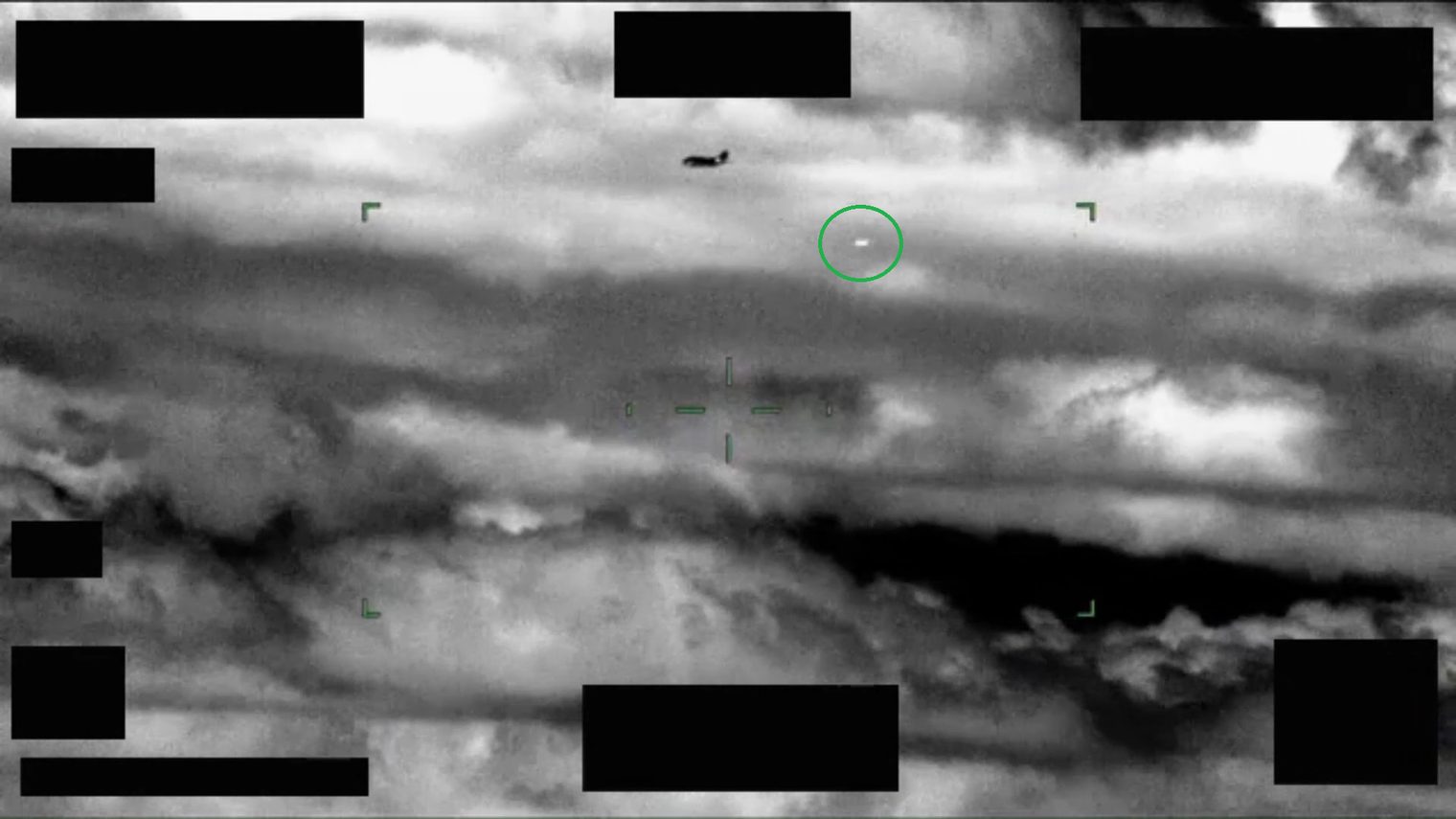 U.S. Coast Guard infrared sensor still showing an unidentified object near an aircraft over the southeastern United States, April 2024. Released May 22, 2026 by the U.S. Department of War as part of the second PURSUE tranche.